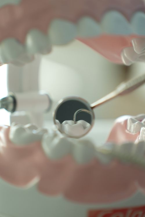 Dental tools representing a science-based approach to oral microbiome whitening and care